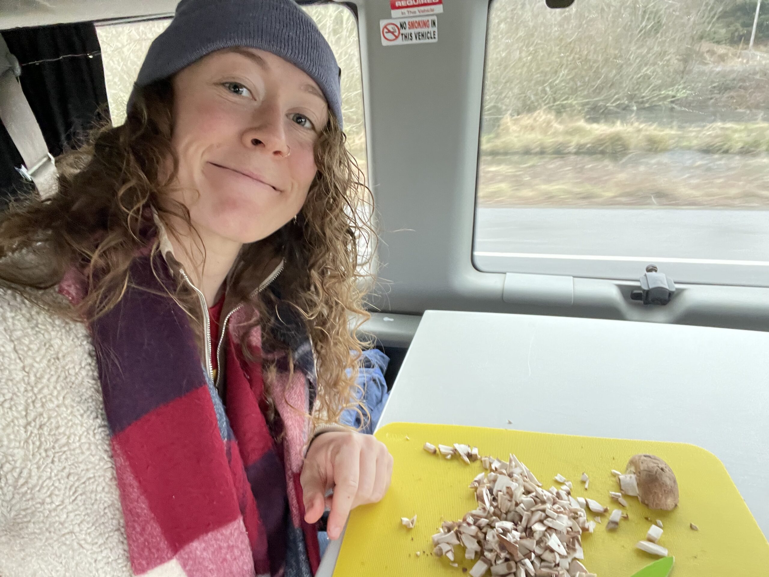 Me using the table in the backseat